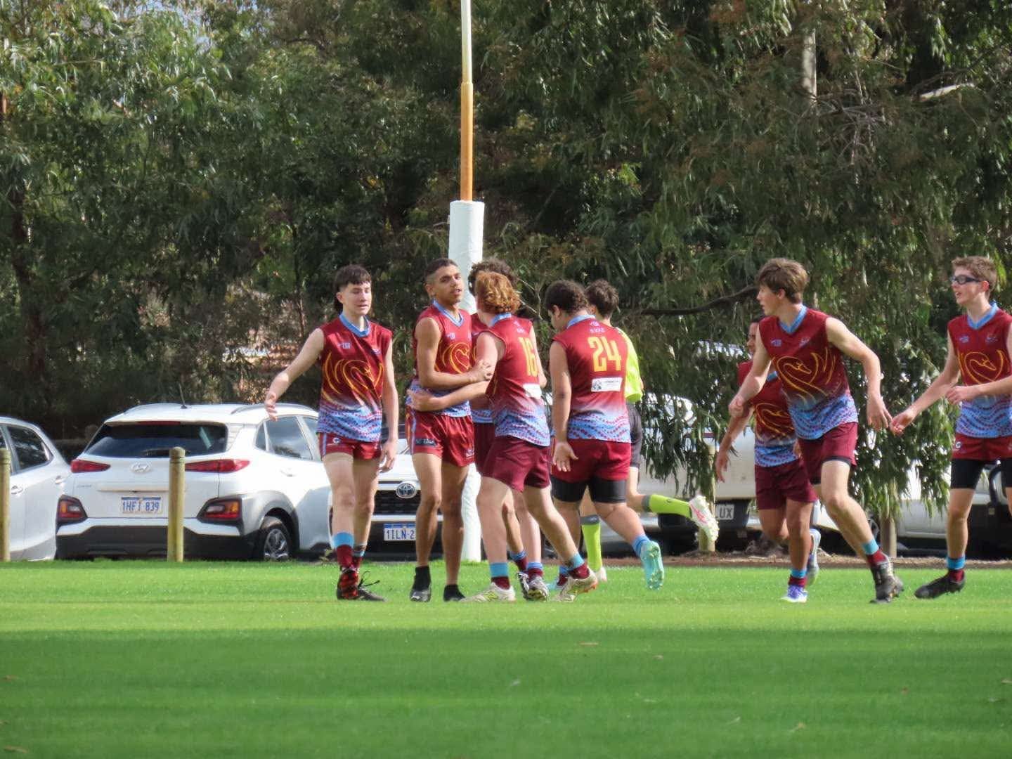 Youth players in club colours during a game at the ground