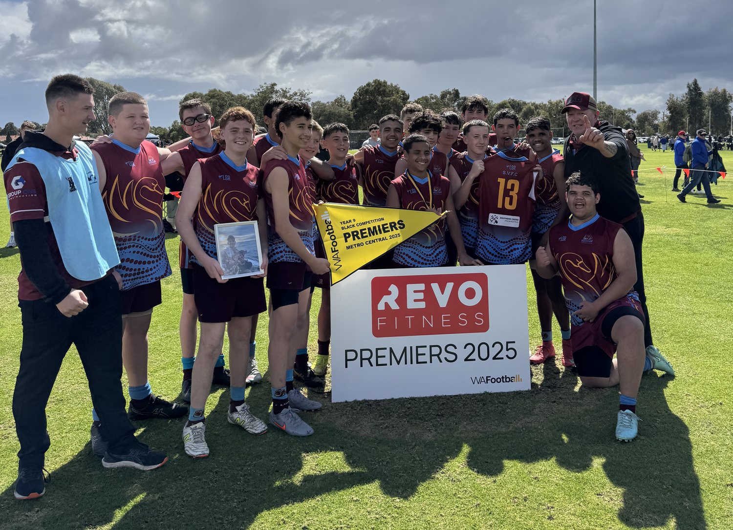 Year 9 team with the Premiers 2025 sign and pennant